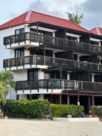 Second floor end unit with wrap around balcony