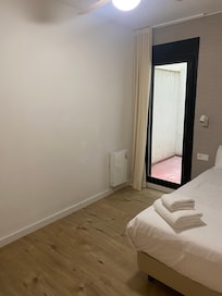 This is the view from another bedroom on the upper floor. It is still facing a tiny walled space.