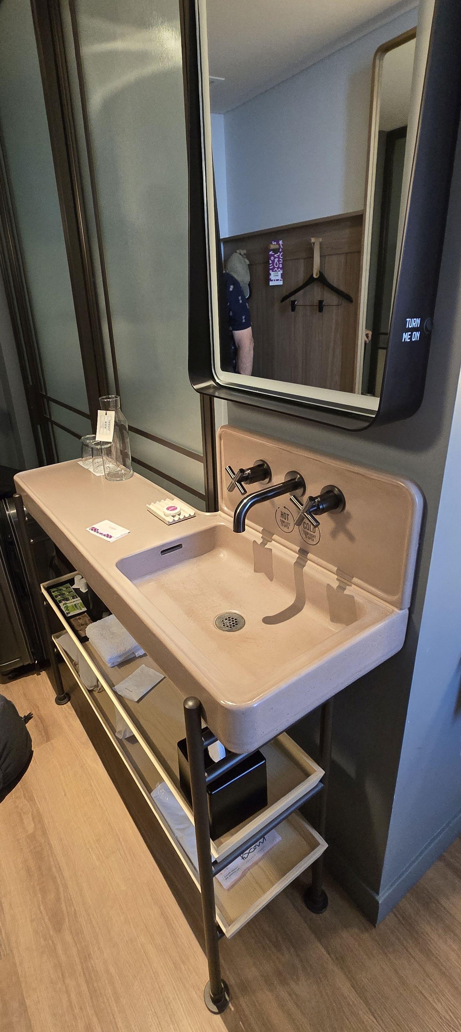 Sink outside bathroom