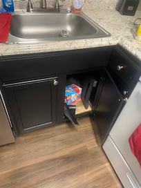 Kitchen cabinets door open upon arrival