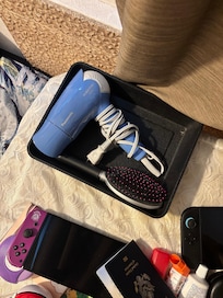 Used guest items including a hair brush
The ad showed clean and wrapped unused items