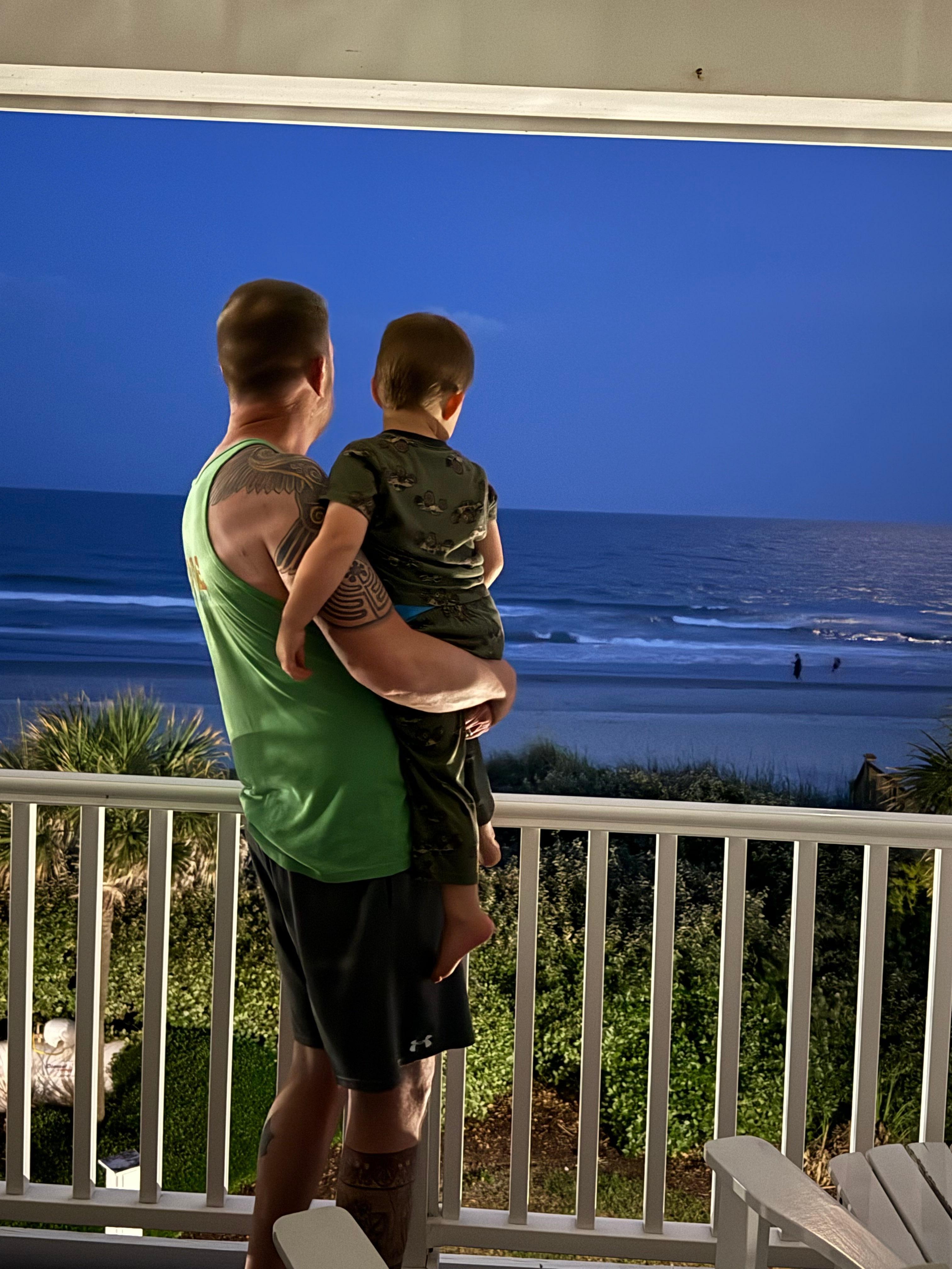 Enjoying a view of the moon from the porch.