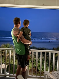 Enjoying a view of the moon from the porch.