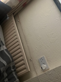 Holes in wall could easily be filled & repainted
