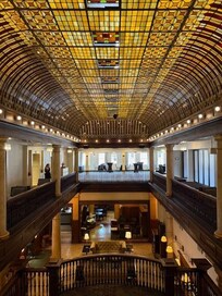 View of stained glass ceiling and lobby from the grand staircase