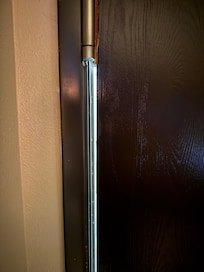 Gap in the door that anybody from outside could look right into our room