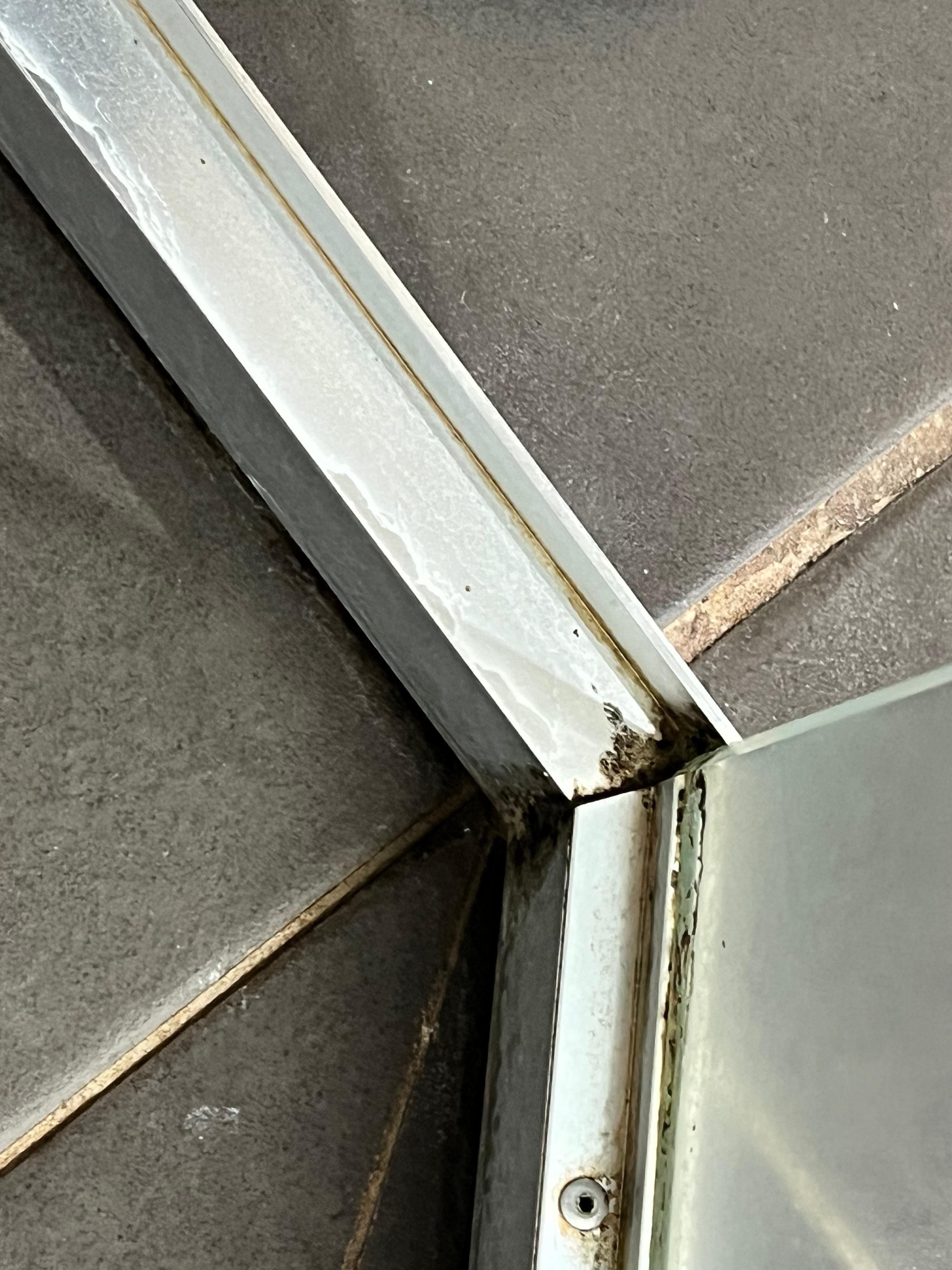 Mould all around inside shower 