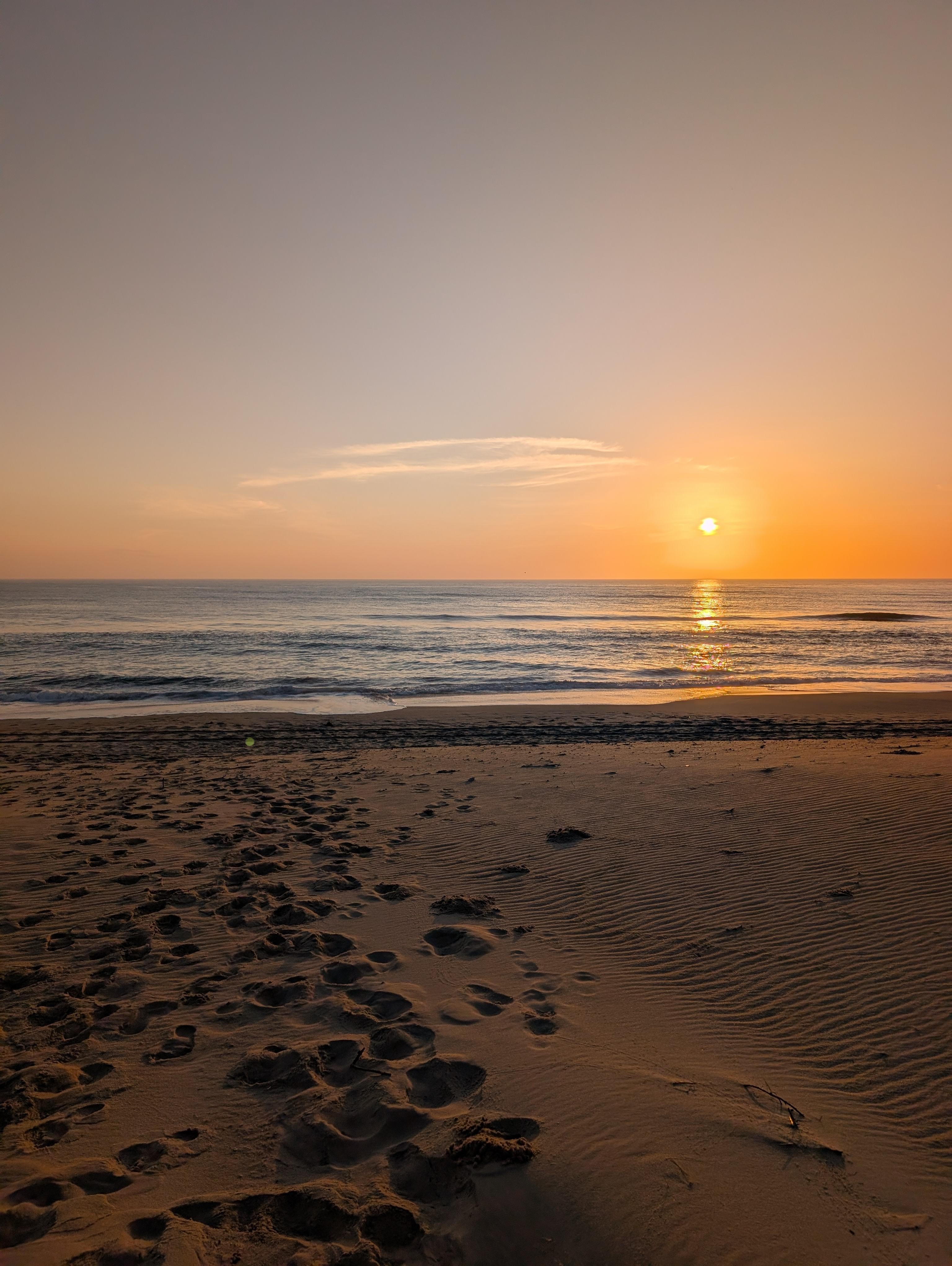 Sunrise from the end of the board walk on the beach ⛱️