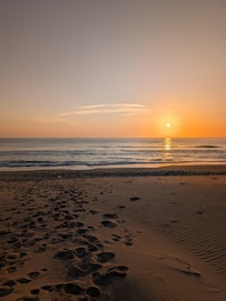 Sunrise from the end of the board walk on the beach ⛱️