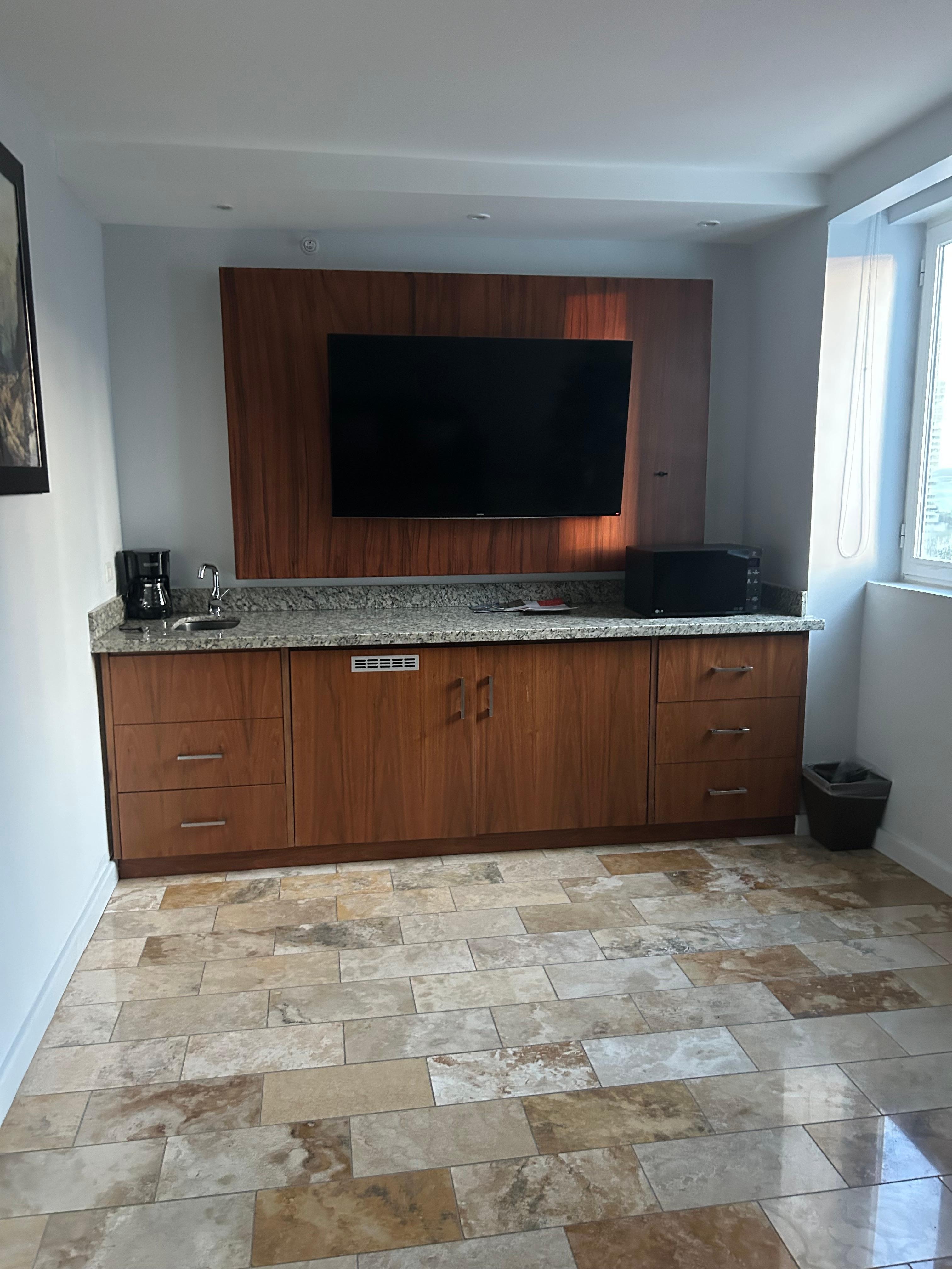 No kitchen, per se, but you get a microwave in the suite, which the rooms don’t have