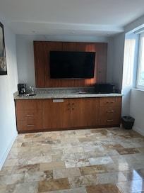 No kitchen, per se, but you get a microwave in the suite, which the rooms don’t have
