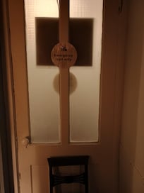 The emergency door opens to another rental unit with no way to lock it from outside. We initially put a chair in front of it so we could hear in someone tried to come in.