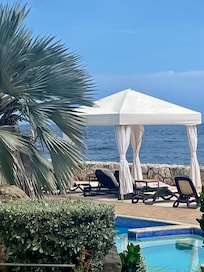 Poolside loungers with shade