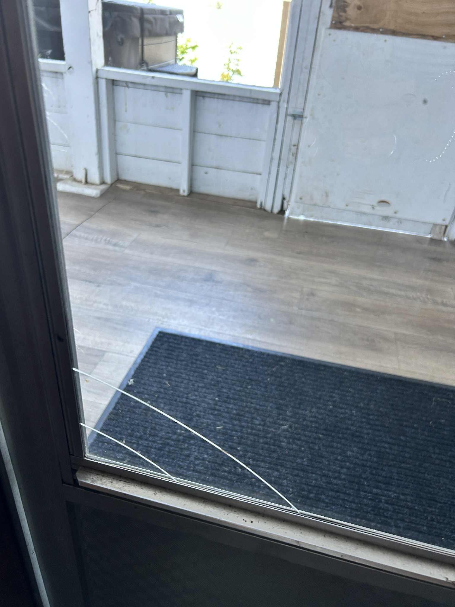 Cracked glass in door leading outside