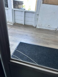 Cracked glass in door leading outside