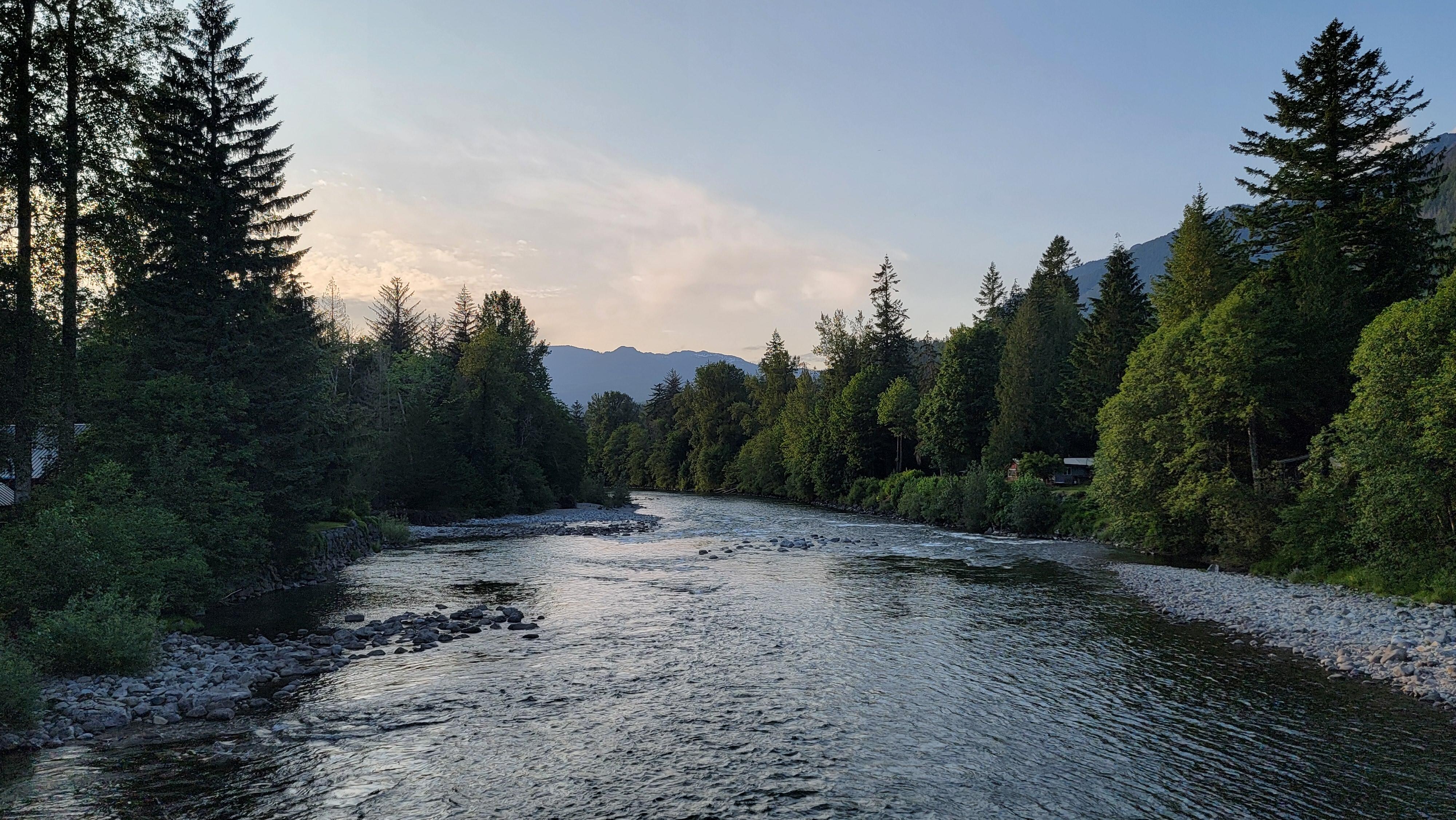 Down river from the bridge.