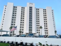Front of the building on the street side. Well maintained building.