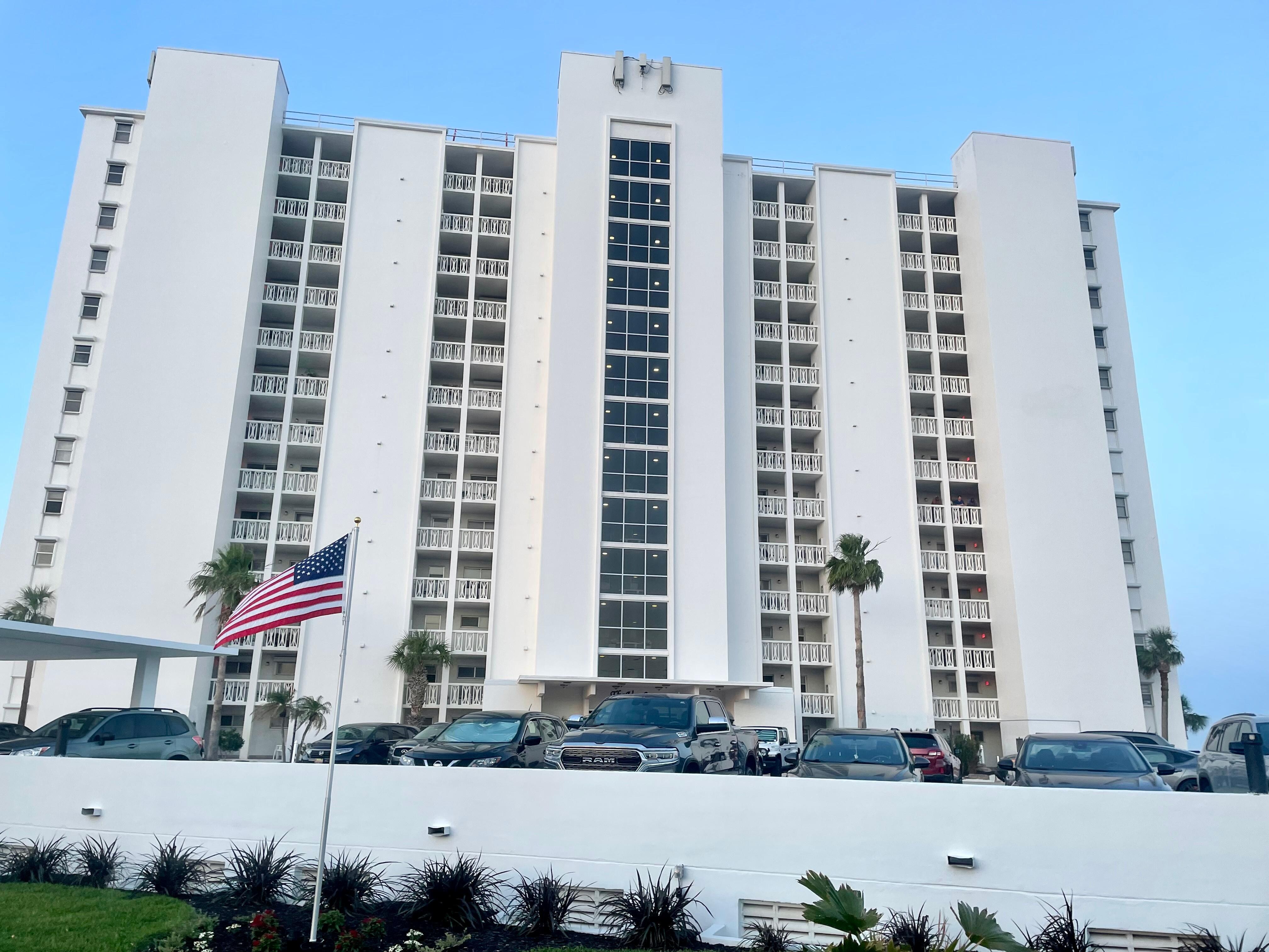 Front of the building on the street side. Well maintained building.
