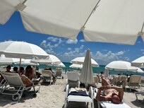 Beach view with chairs, umbrella and towels included with stay!!