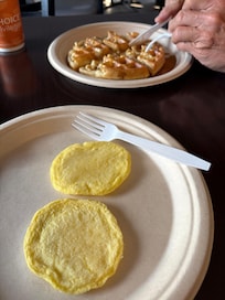 Those yellow things are eggs. They were rubbery. There wasn’t any toast or bagels or muffins. Waffles were good.