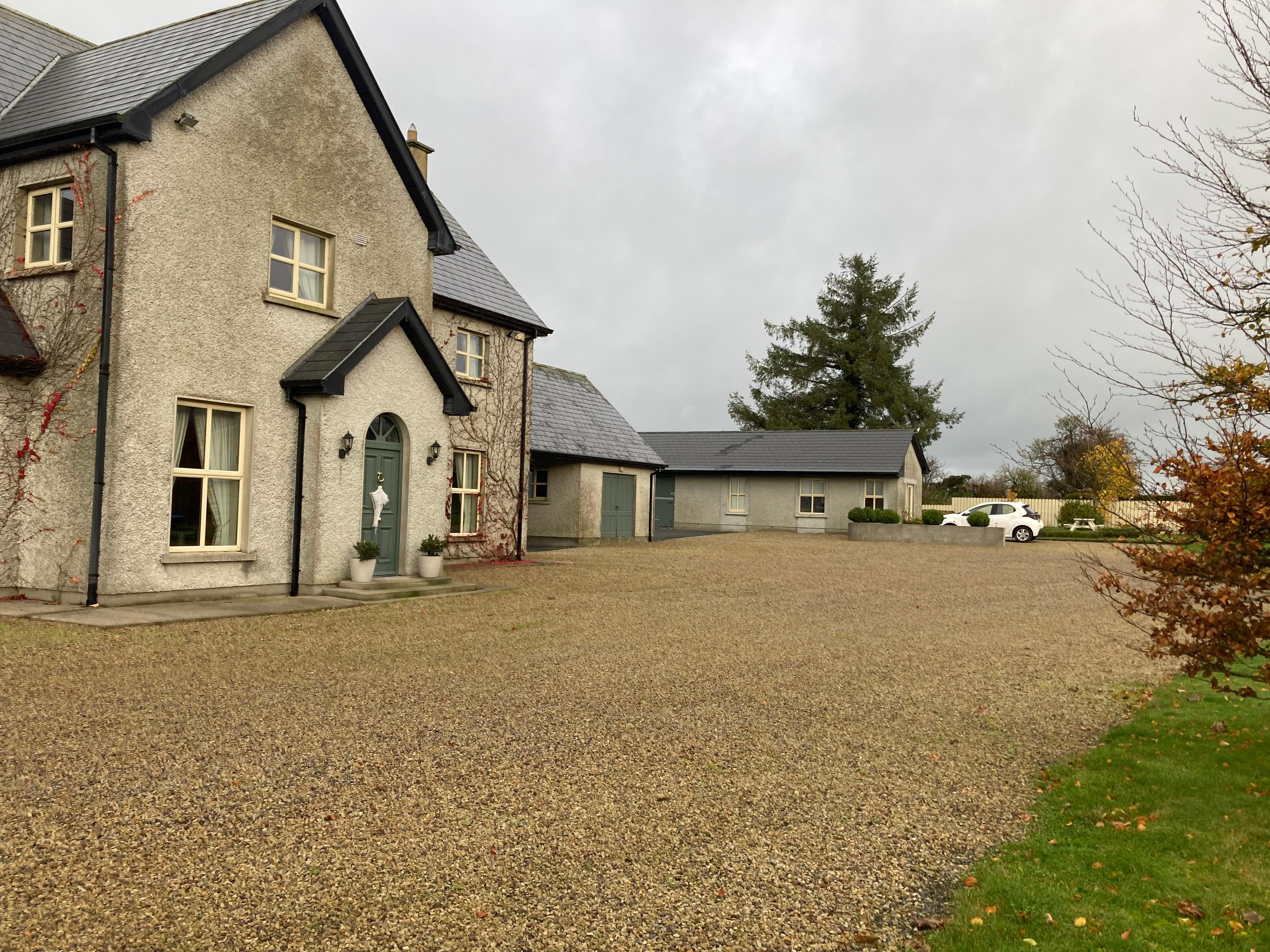 The main house with cottage in background 
