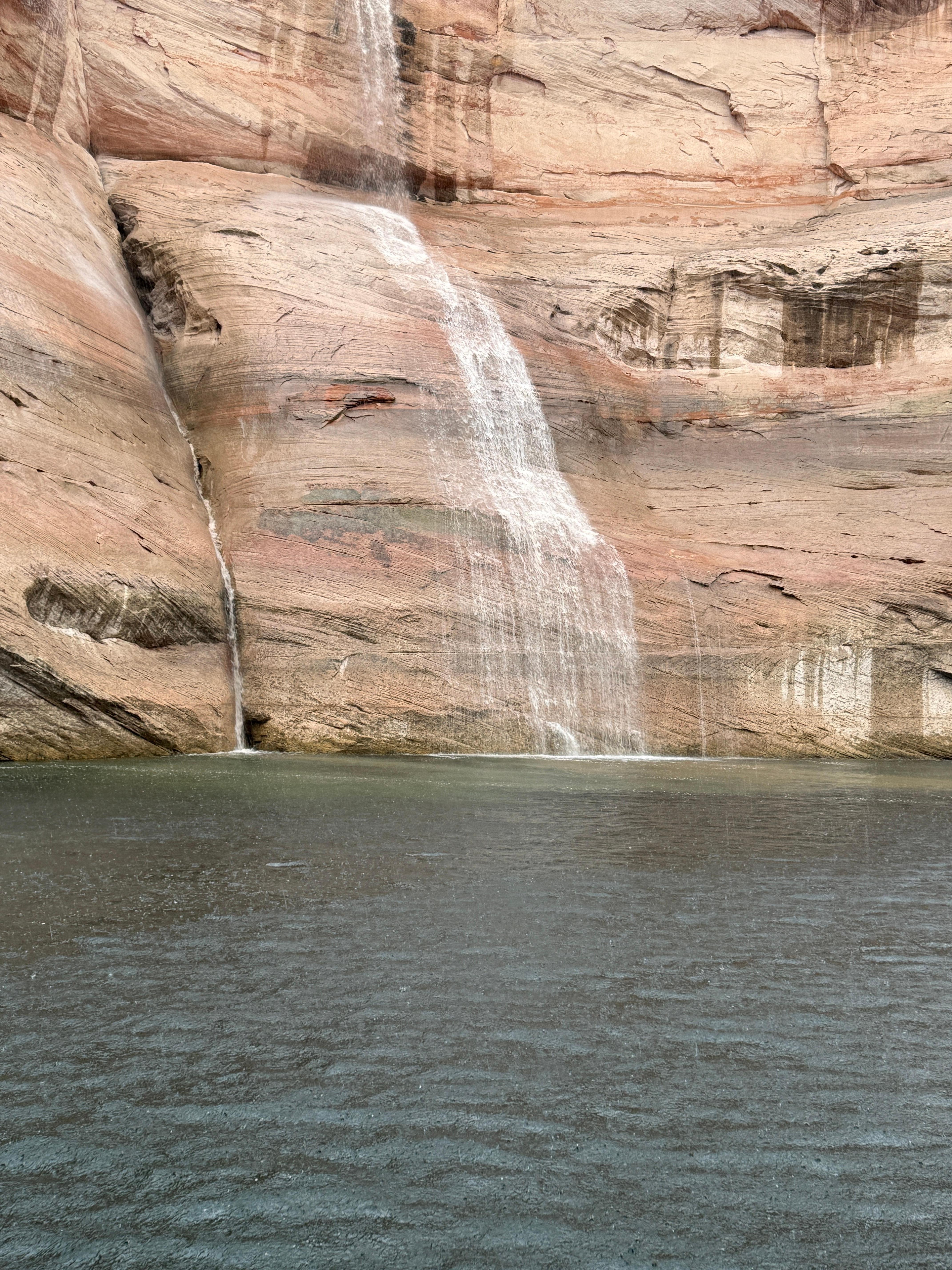 Waterfall from flash flooding at Antelope canyon boat tour