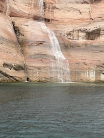 Waterfall from flash flooding at Antelope canyon boat tour