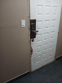 The door to the room repaird several times.