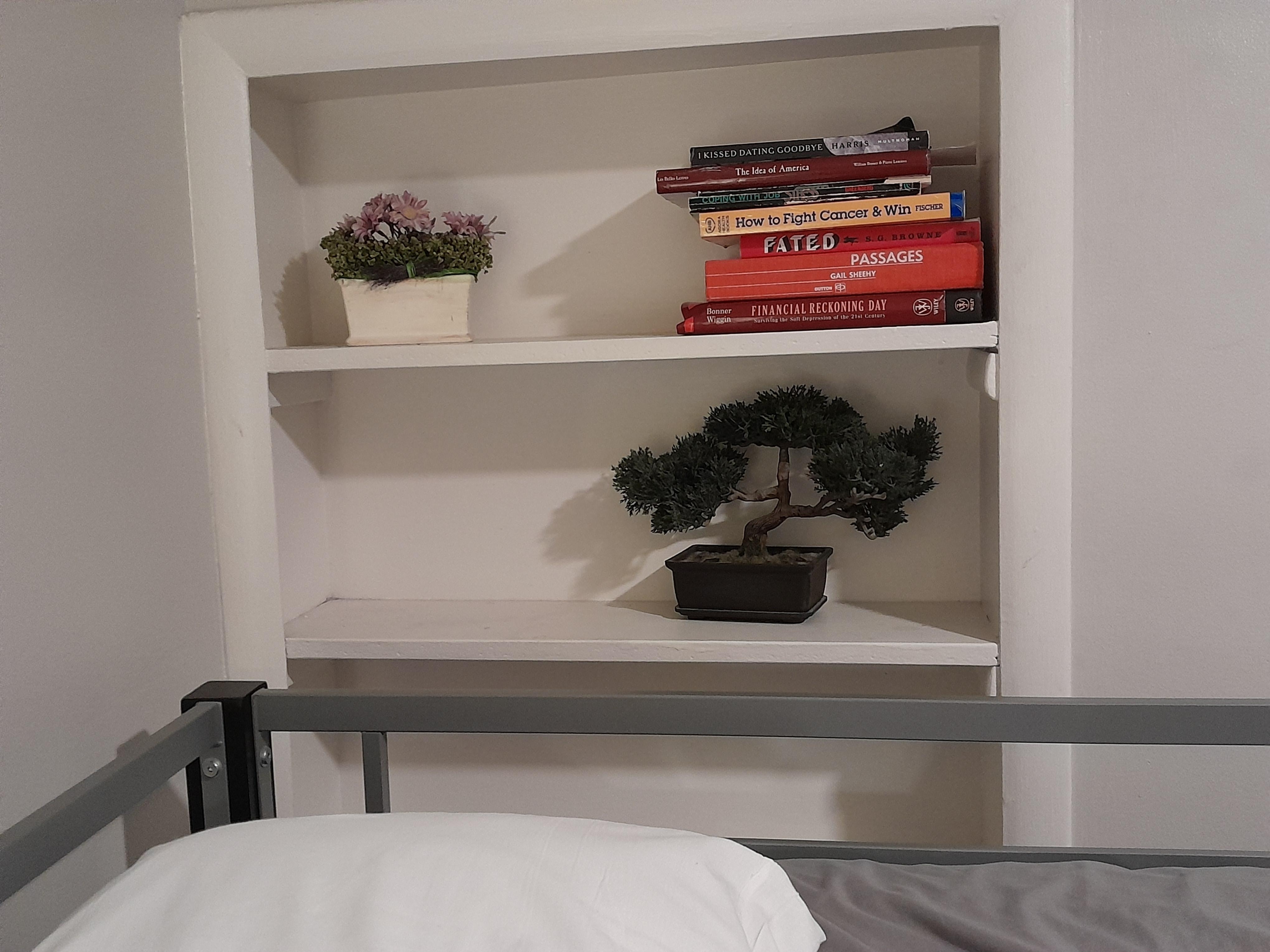 This was very charming. Cute built-in bookshelf. 