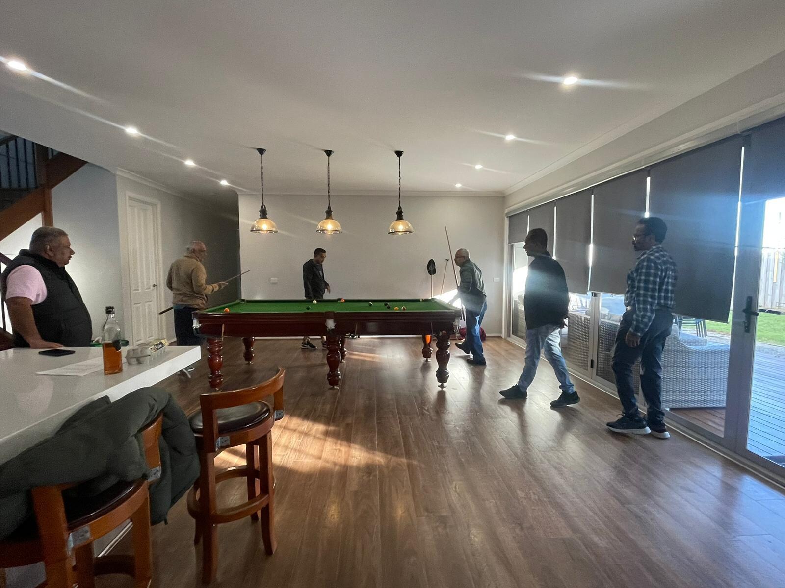 Boys playing pool