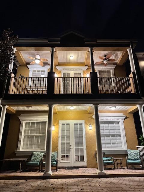 Back of house at night. View overlooks the golf course. 