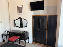 Television and wardrobe table and chair