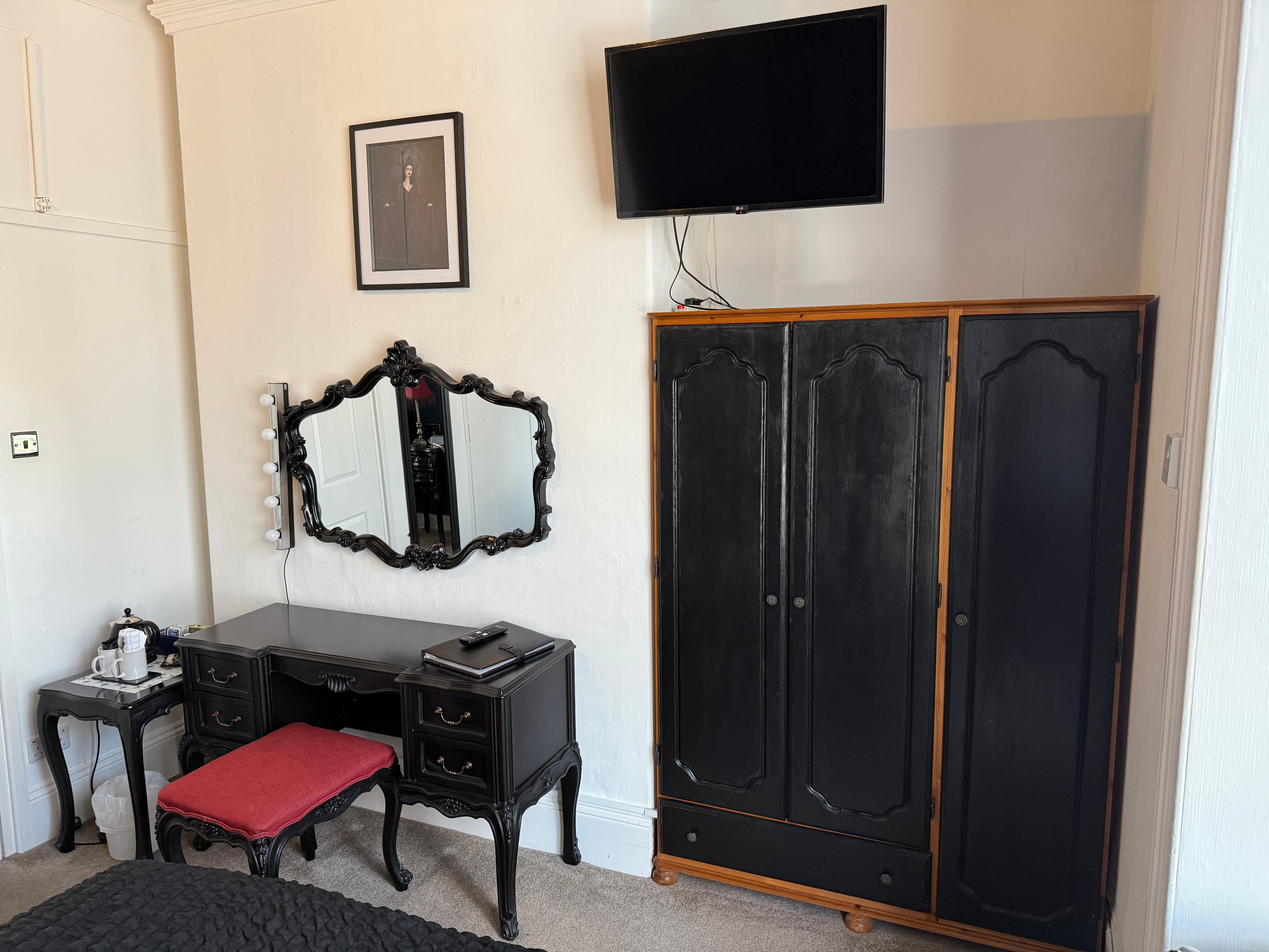 Television and wardrobe table and chair 