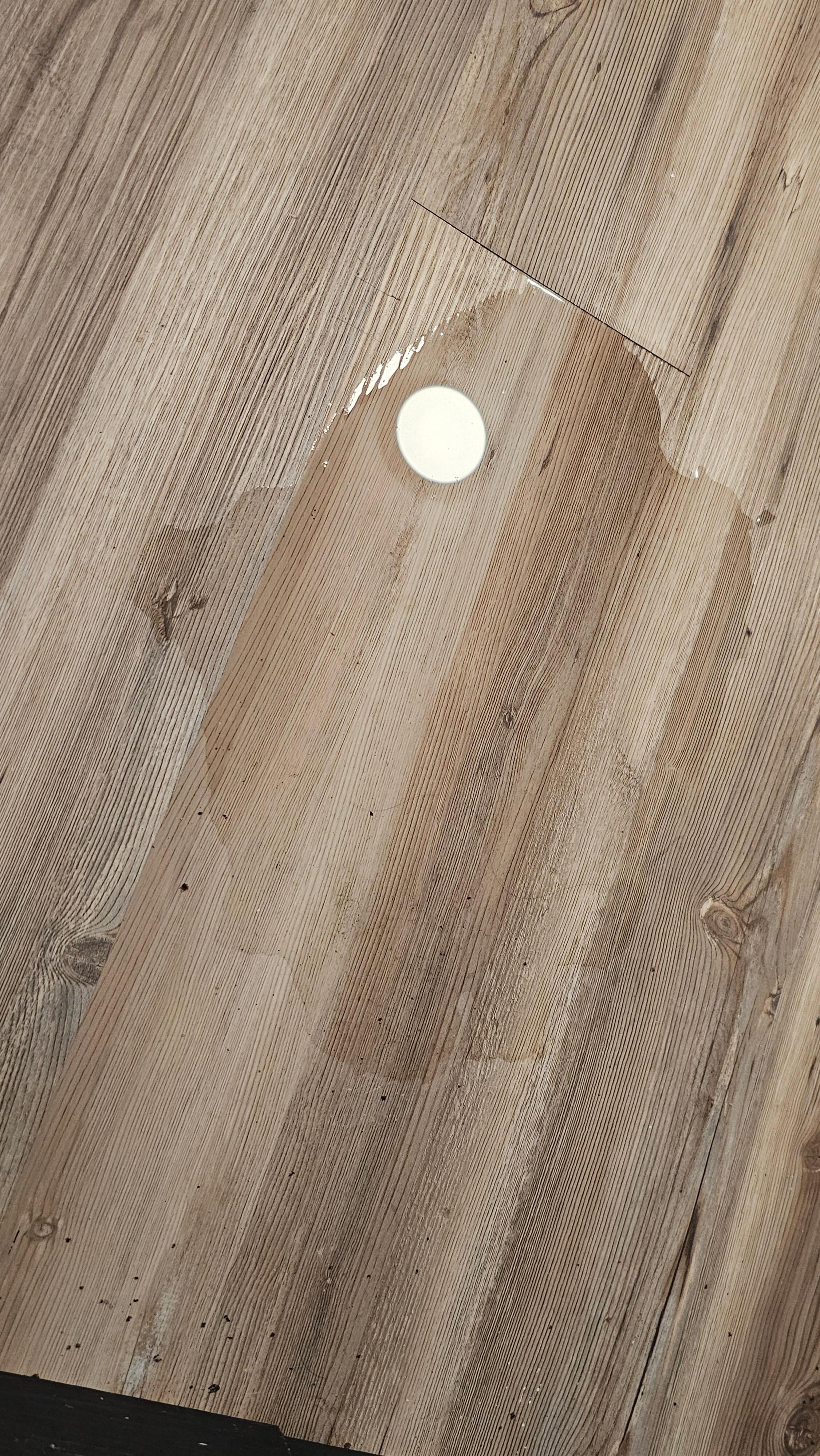 Water seeping up through laundry room floor 