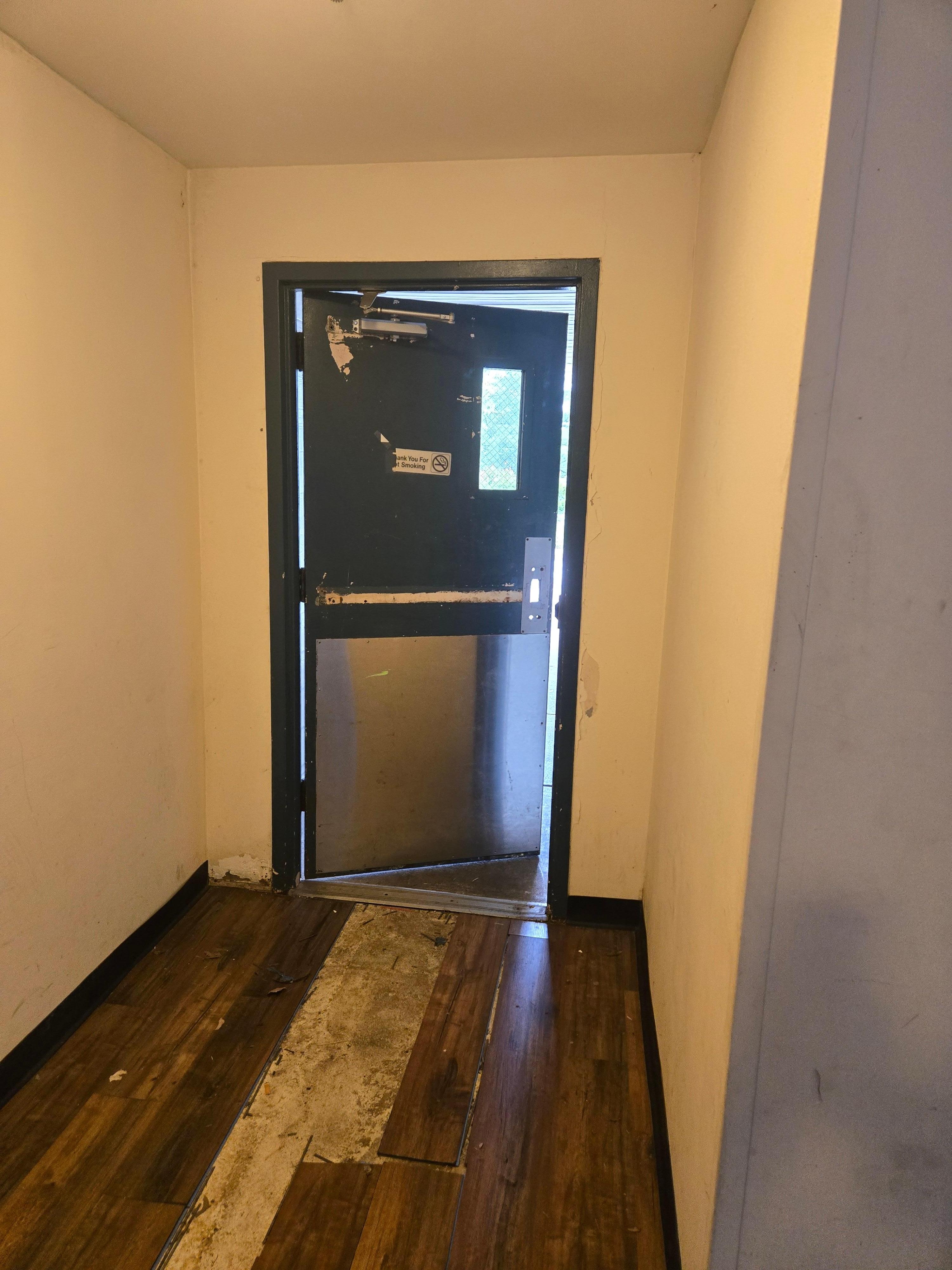 First floor exit door, no lock.