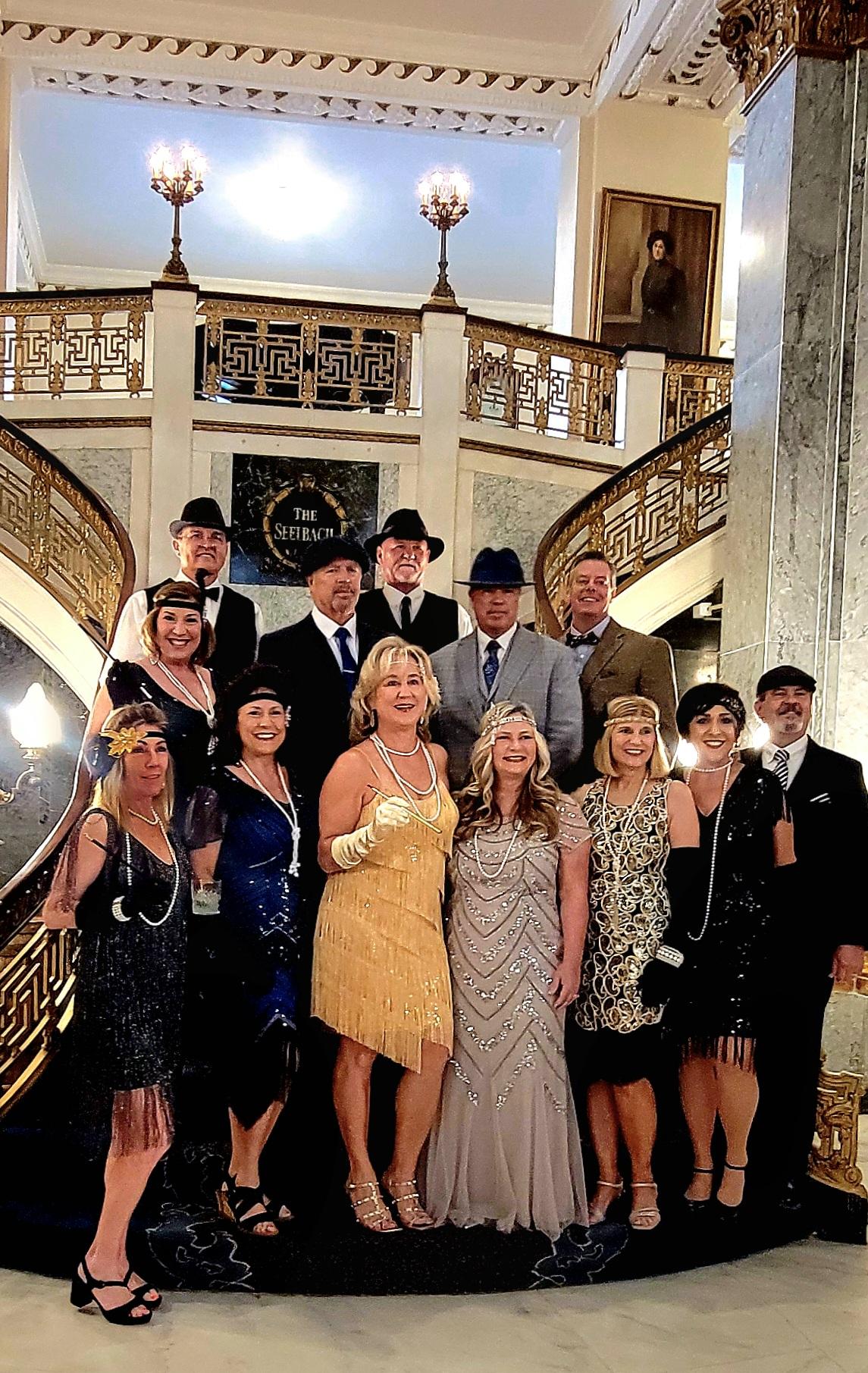 Photo Op on beautiful hotel stairs for a pre Derby party at Churchill Downs.