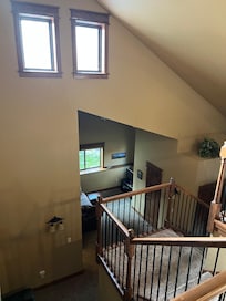 Looking down from master bedroom to entrance level