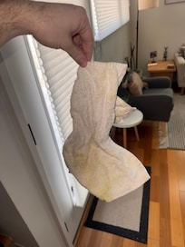 When checking for clean towels, this was stuffed in the cabinet in the pile. NASTY!