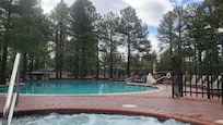 Quite a large pool and an adequate hot tub