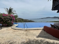 Pool with a view of the beach.
