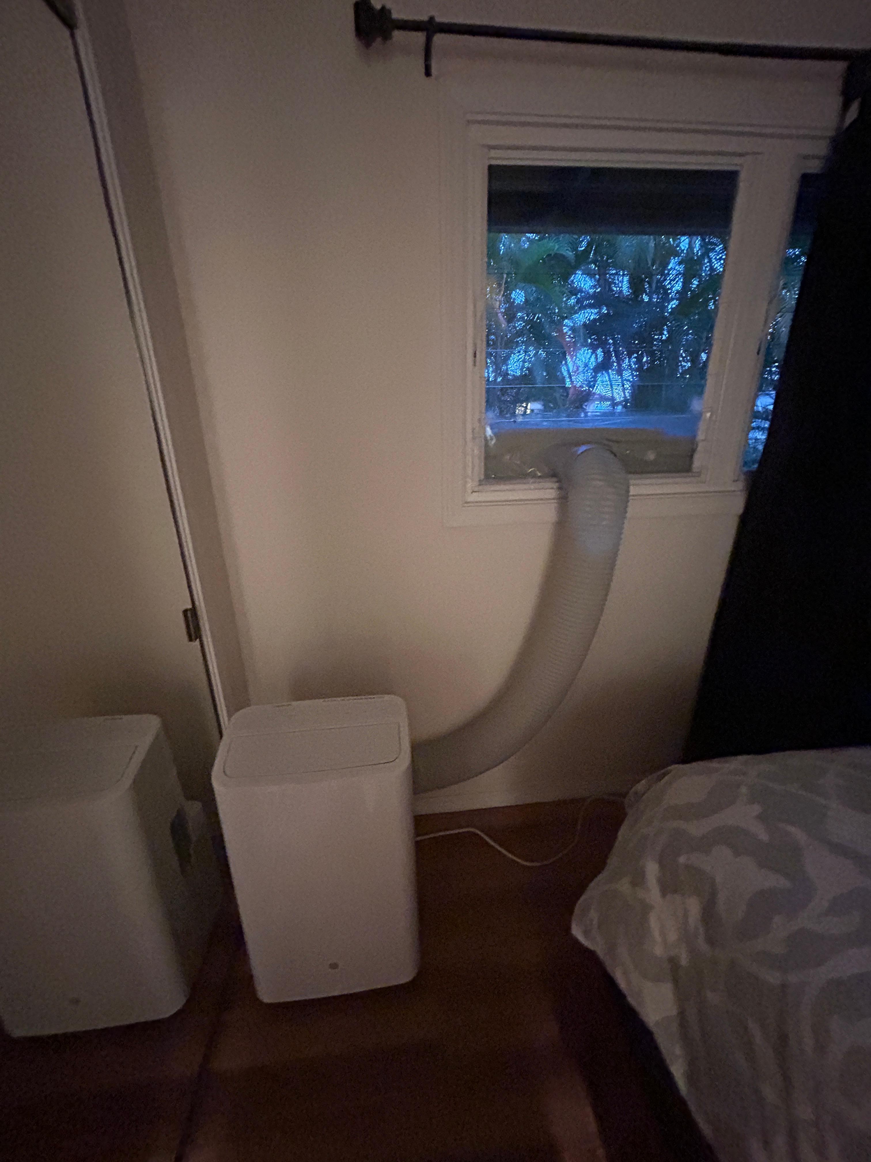 bedroom, window is blocked by AC, the limited floor space is taken 