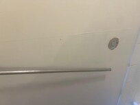Broken towel holder- maintenance guy fixed it.