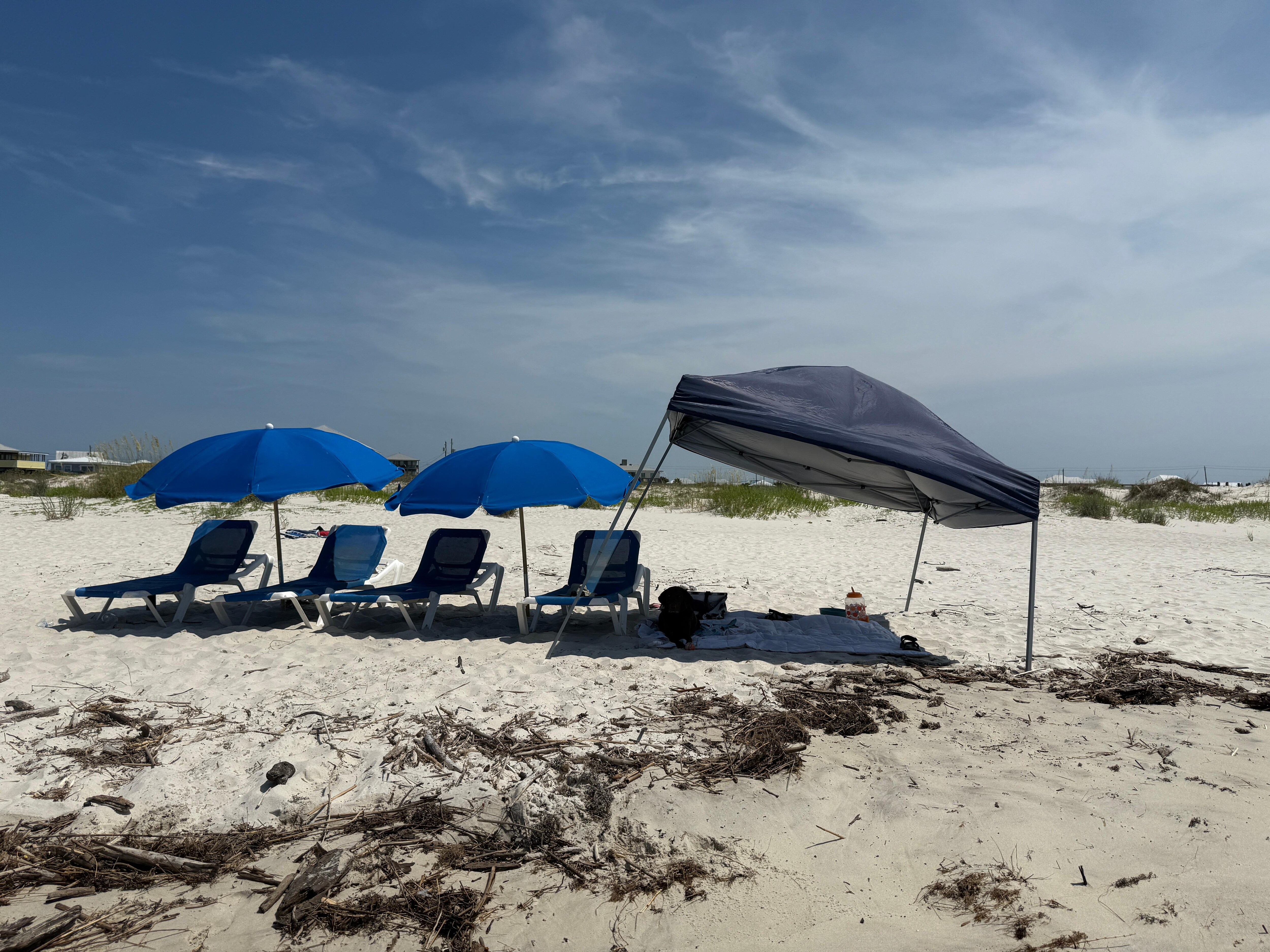 Beach area, barely any other people on the beach.  We rented lounge chairs and umbrellas to be delivered to beach. Highly recommend. 
