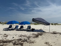 Beach area, barely any other people on the beach.  We rented lounge chairs and umbrellas to be delivered to beach. Highly recommend.