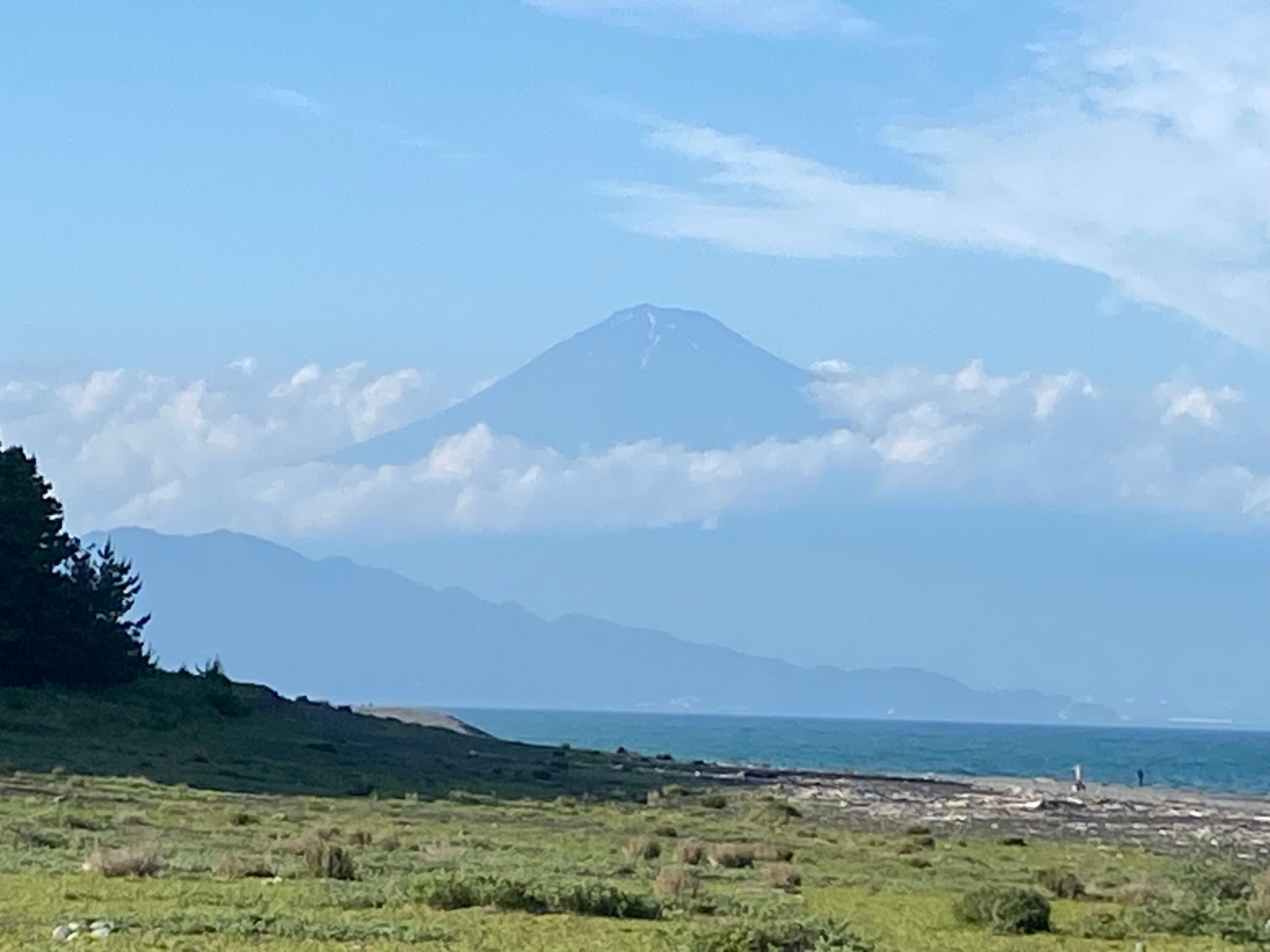 A view of Mount fuji (without the snow cap of course) the pine trees, and the ocean. Taken from the beach about 5 minutes from the Hotel/Ryokan.