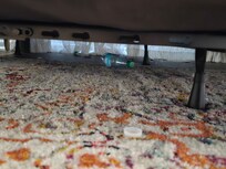 items under bed in room 1