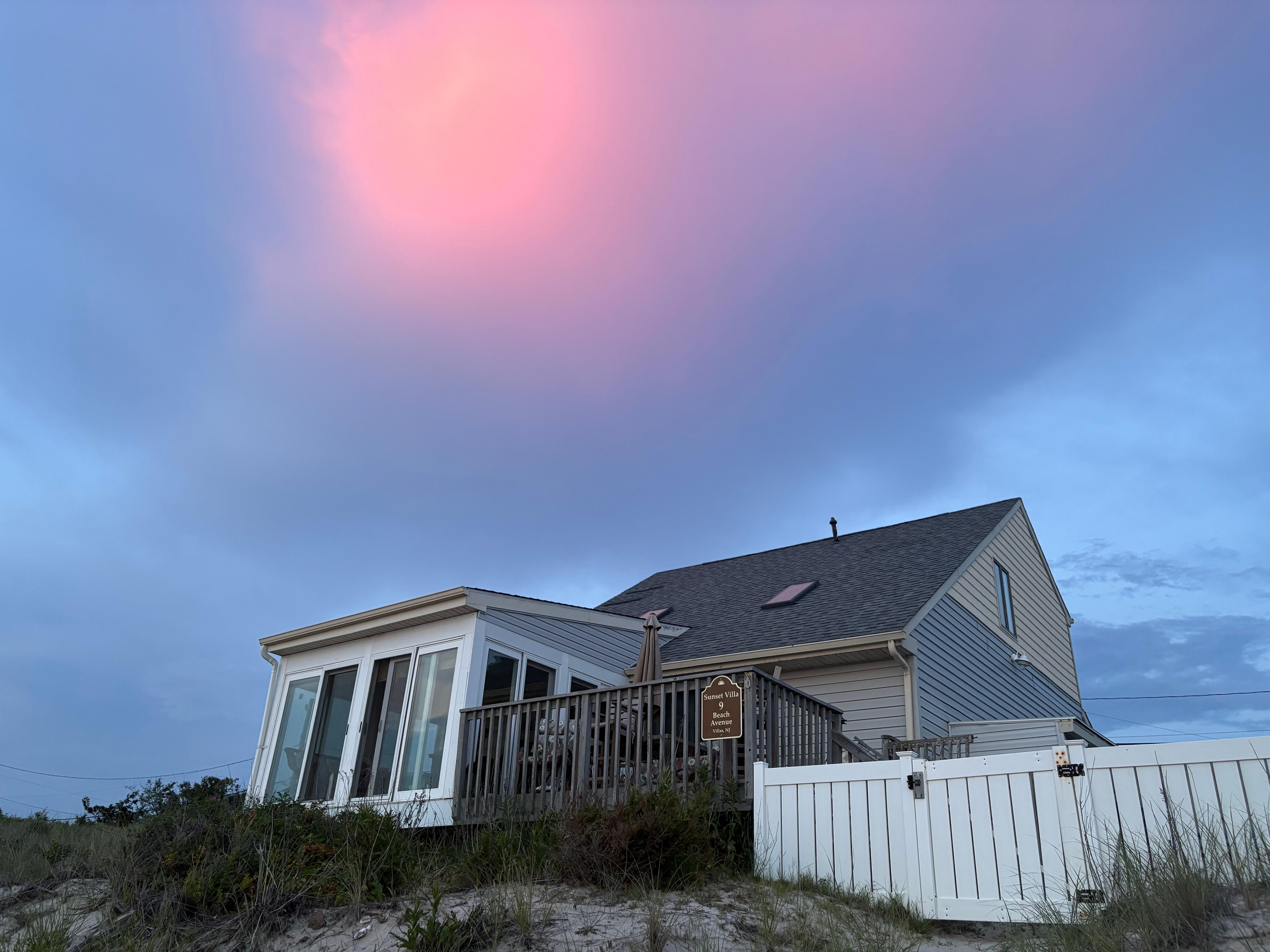 While watching the sunset, we looked back at the house and saw this amazing reflection of the sun’s rays showing a pink sky!