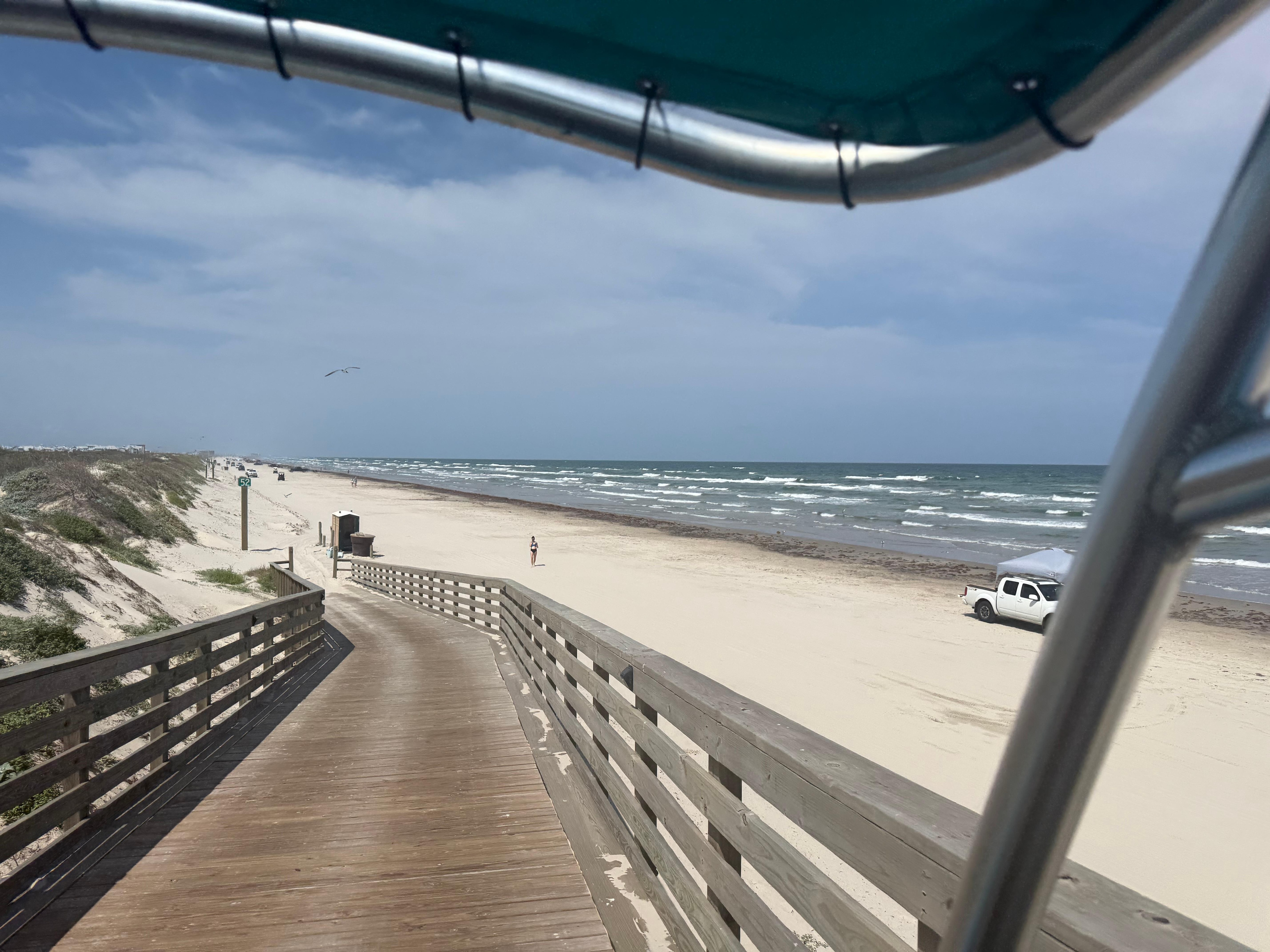 2 minute by golf cart or 5 minute walk to beach. Beach was not terribly busy where we were. 