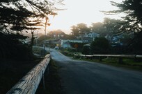 Around the corner from the house by the gate to the beach parking lot