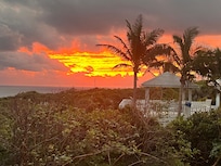 Watching the sunrise from the veranda.